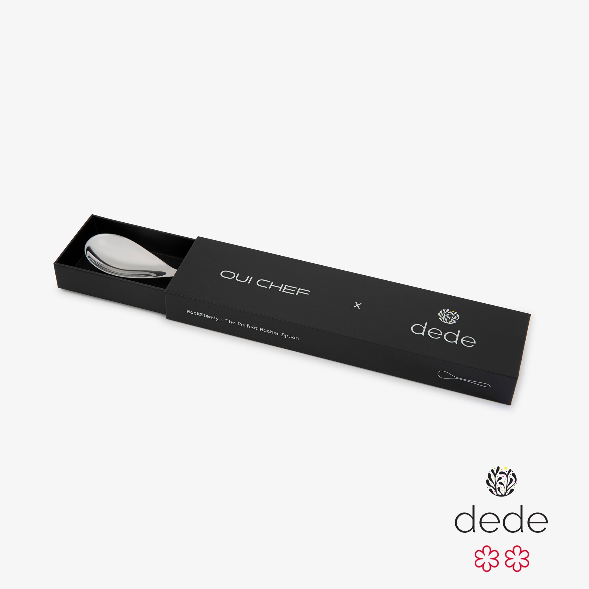 Black packaging box with a spoon inside, featuring 'Oui Chef' and 'dede' logos on a white background.