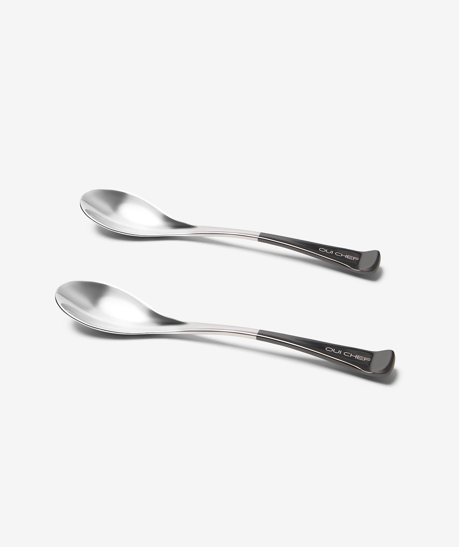 Medium and large SignatureSpoon lying side by side